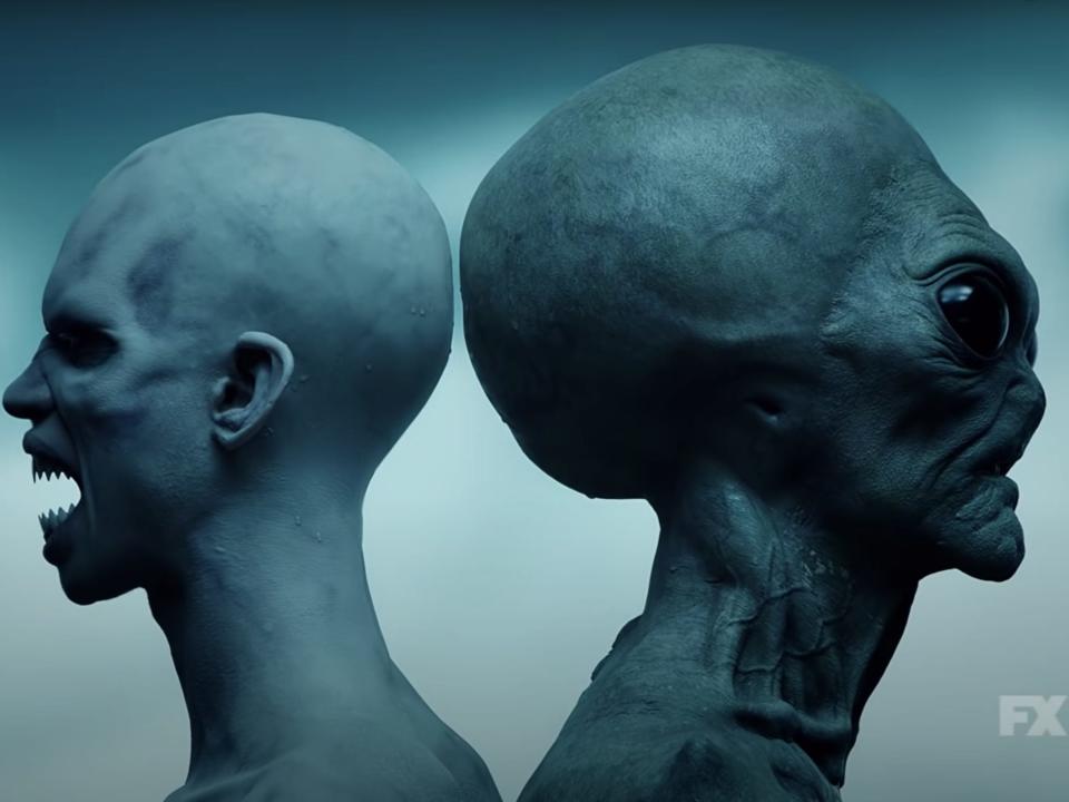 A still from the teaser trailer of "American Horror Story: Double Feature" showing an alien and a humanoid creature back to back.