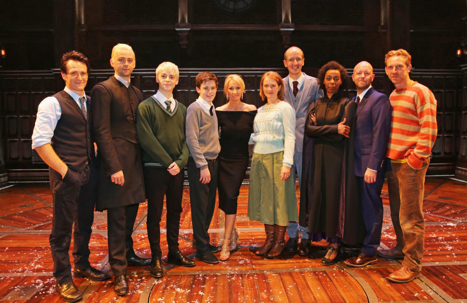 LONDON, ENGLAND - JULY 30:  (L to R) Jamie Parker, Alex Price, Anthony Boyle, Sam Clemmett, J.K. Rowling, Poppy Miller, Jack Thorne, Noma Dumezweni, director John Tiffany and Paul Thornley attends the press preview of "Harry Potter & The Cursed Child" at The Palace Theatre on July 30, 2016 in London, England.  (Photo by David M. Benett/Dave Benett/Getty Images)