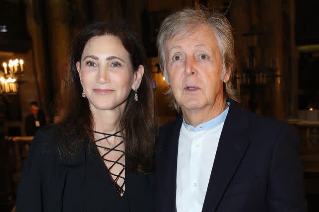 <p>Bertrand Rindoff Petroff/Getty</p> Paul McCartney and wife Nancy Shevell attend Paris Fashion Week in September 2019.