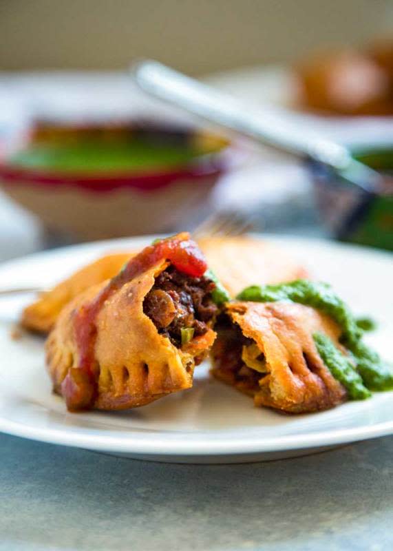 <p>Kevin is Cooking</p><p>Traditional Argentinian baked empanadas filled with beef, onions, paprika, chili powder, cumin, oregano, hard-boiled egg and olives.</p><p><strong>Get the recipe:</strong> <a href="https://keviniscooking.com/empanadas-mendocinas/" rel="nofollow noopener" target="_blank" data-ylk="slk:Empanadas Mendocinas;elm:context_link;itc:0;sec:content-canvas" class="link rapid-noclick-resp">Empanadas Mendocinas</a></p>