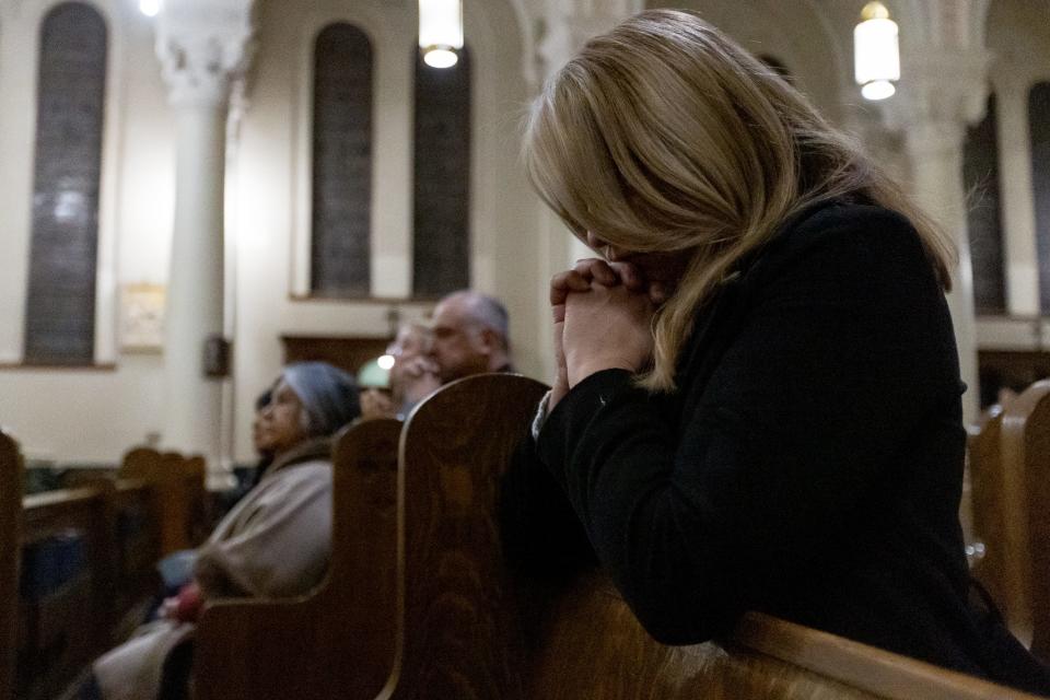 El Pasoans pray the rosary to the Virgen de Guadalupe on her patron saint day Tuesday morning, Dec. 12, 2023, at St. Patrick Cathedral.