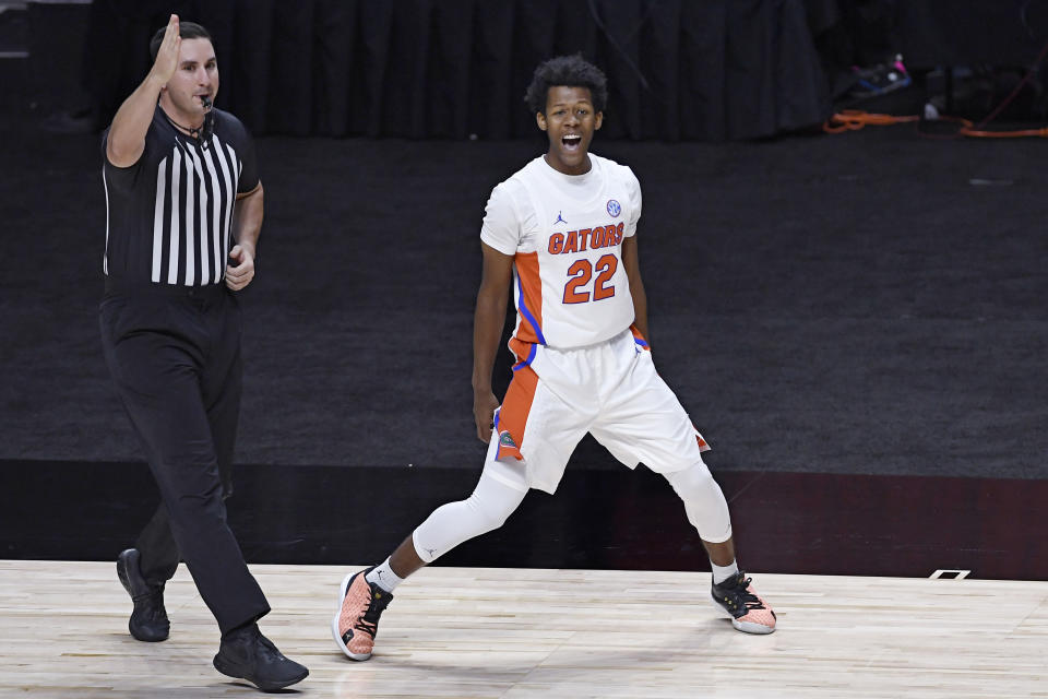 Florida's Tyree Appleby celebrates his basket putting Florida ahead for the first time in the game in the second half of an NCAA college basketball game against Army, Wednesday, Dec. 2, 2020, in Uncasville, Conn. (AP Photo/Jessica Hill)