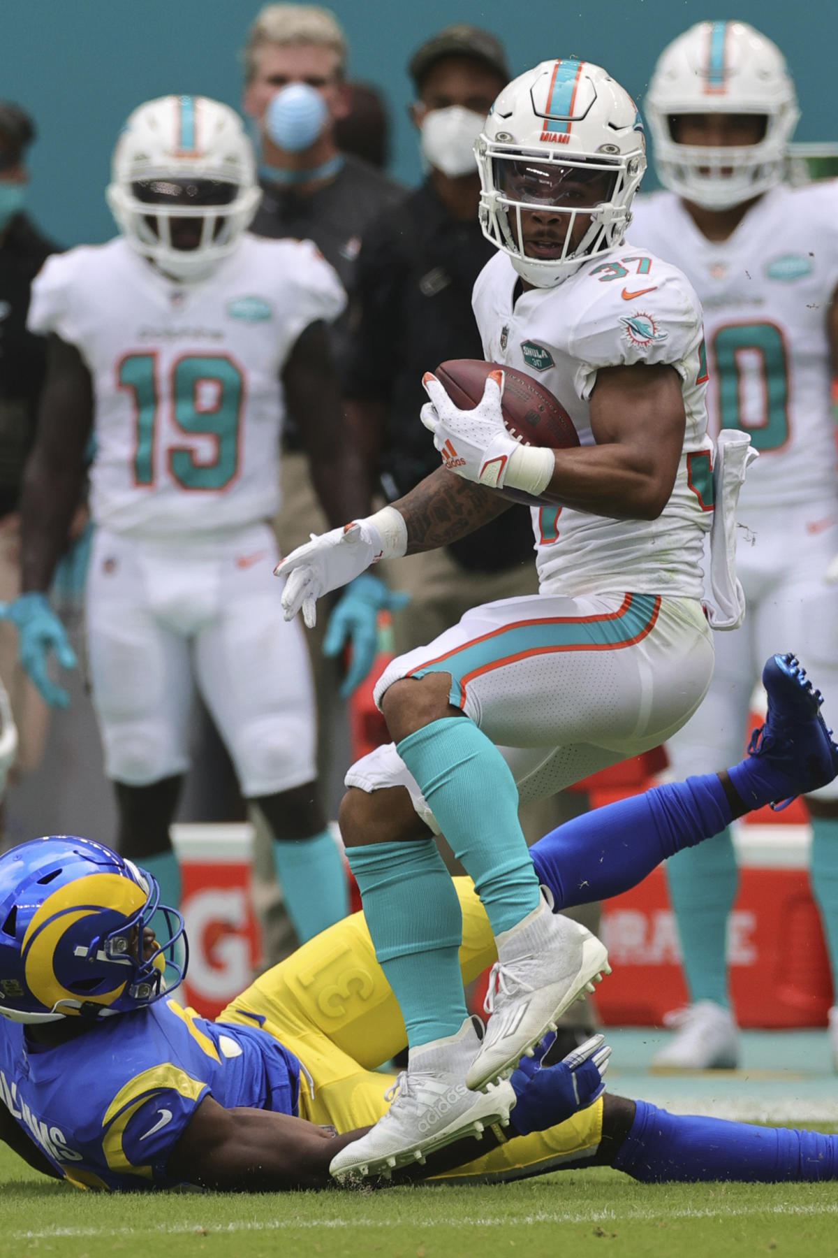 Dolphins RBs Gaskin and Breida miss practice with injuries