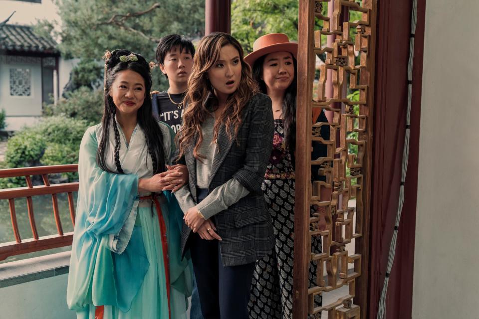 Kat (Stephanie Hsu, far left) shows off her hunky beau to Deadeye (Sabrina Wu), Audrey (Ashley Park) and Lolo (Sherry Cola) in "Joy Ride."