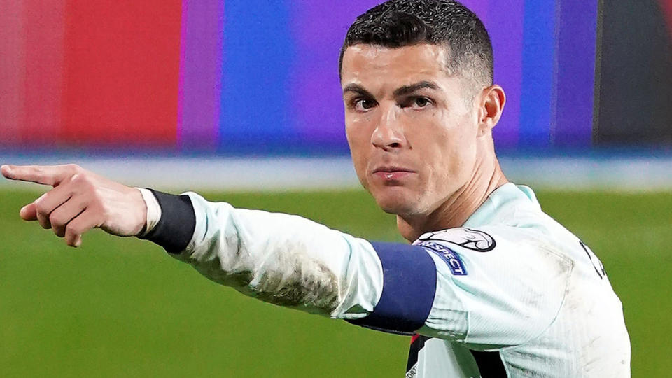 An armband tossed away in disgust by Christiano Ronaldo is being auctioned off for charity by a football rival who picked it up. (Photo by Sylvain Lefevre/Getty Images)