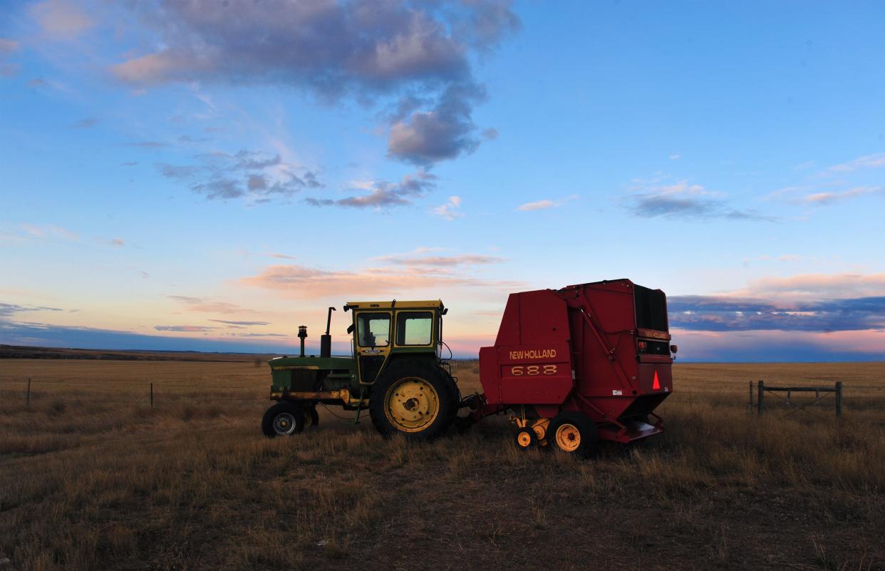 Baling hay on the fields of McCone County in eastern Montana