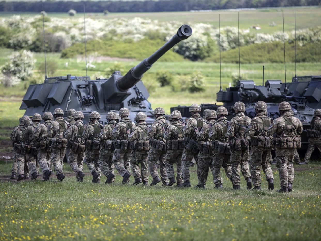 Soldiers of the Royal Artillery take part in the Artillery's 300th anniversary celebrations at Knighton Down on 26 May, 2016 in Lark Hill: Richard Pohle - WPA Pool /Getty Images