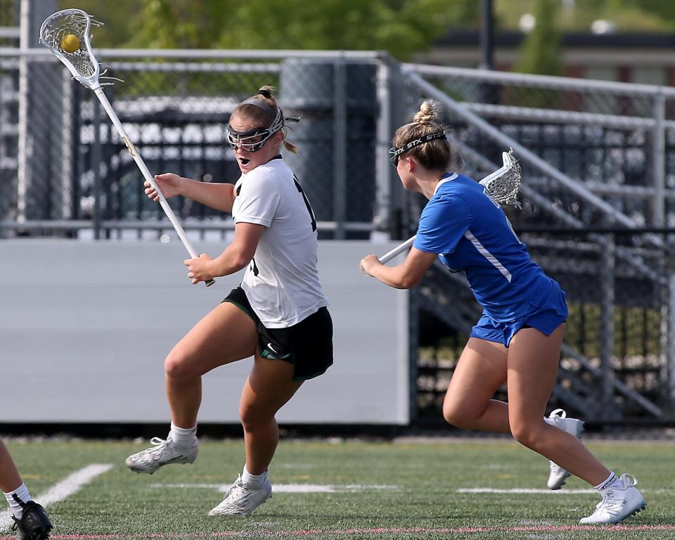 Marshfield's Maija Kastrud makes a move toward the net to get in position for a shot during first-half action of a game against Scituate at Marshfield High on Tuesday, May 16, 2023.
