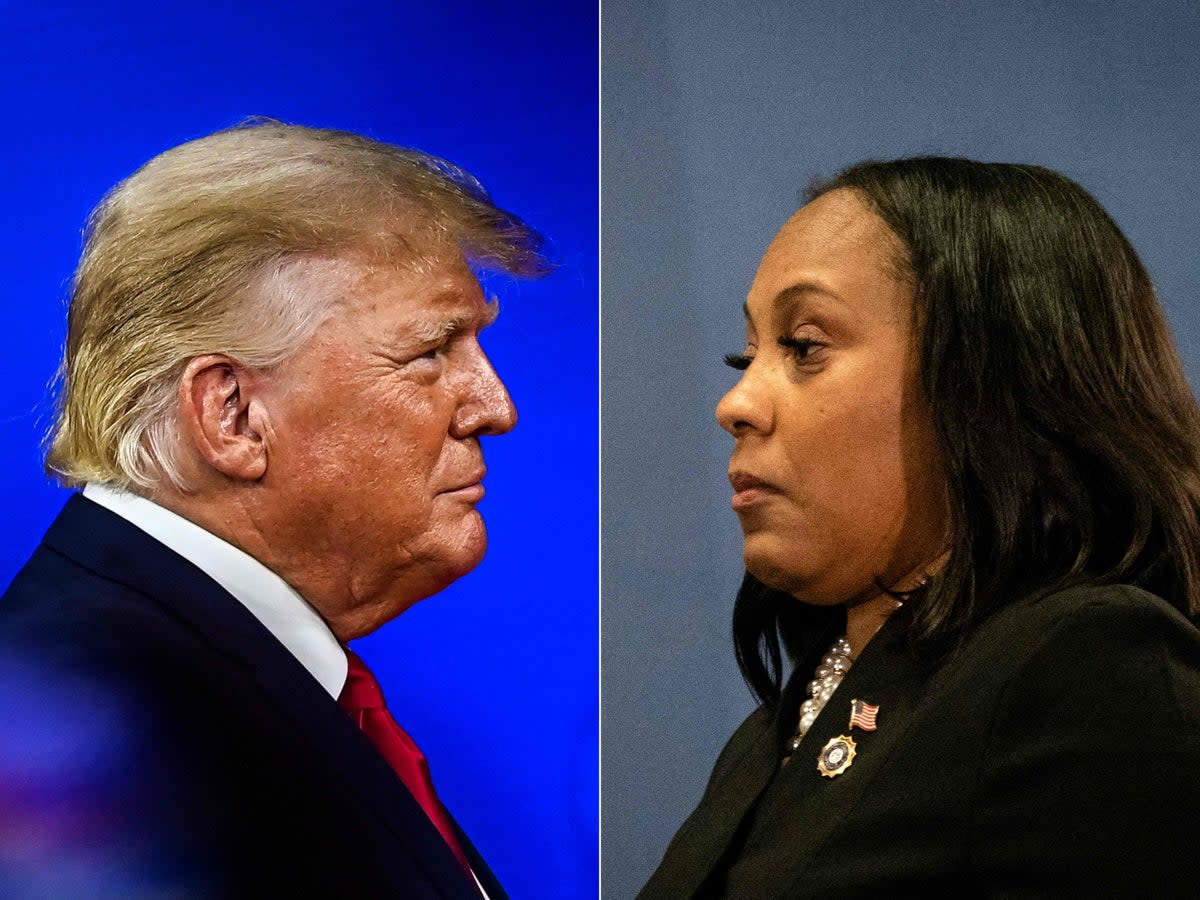 Combination of photos shows former US president Donald Trump (left) and Fulton County District Attorney Fani Willis (right) (AFP via Getty Images)