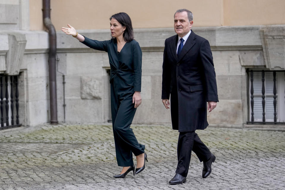 CORRECTS DATE German Foreign Minister Annalena Baerbock, left, welcomes Azerbaijan's Foreign Minister Jeyhun Bayramov for peace talks in Berlin, Germany, Wednesday, Feb. 28, 2024. Germany sought to move forward talks on a peace treaty between Armenia and Azerbaijan on Wednesday, welcoming the two countries' foreign ministers to Berlin. (AP Photo/Ebrahim Noroozi)