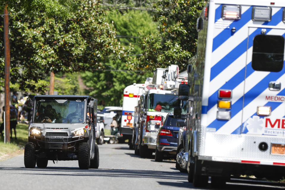 FILE - A Charlotte neighborhood where an officer-involved shooting took place in Charlotte, N.C., Monday, April 29, 2024. The Charlotte-Mecklenburg Police Department says officers from the U.S. Marshals Task Force were carrying out an investigation Monday afternoon in a suburban neighborhood when they came under gunfire. (AP Photo/Nell Redmond, File)