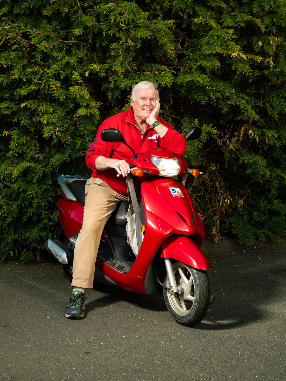 Jim Byrne poses for a portrait with his scooter outside of his home in Connecticut.<span class="copyright">Evan Angelastro for TIME</span>