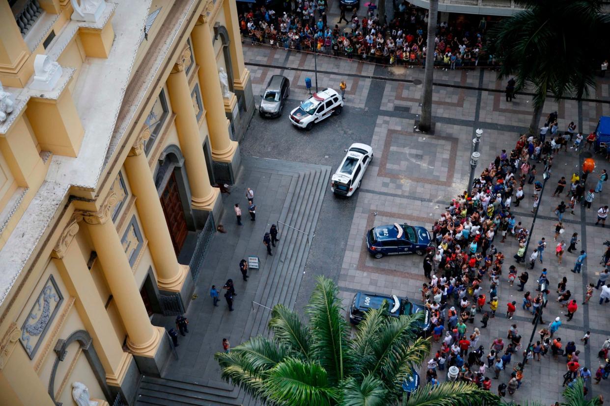 People gathered by the cathedral: AFP/Getty Images