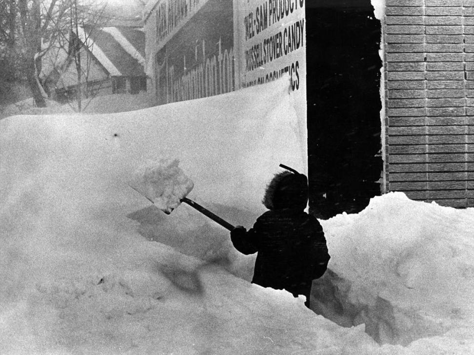 Tackling the task at hand, a resident shovels a path along a Park Avenue sidewalk Feb. 7, 1978.