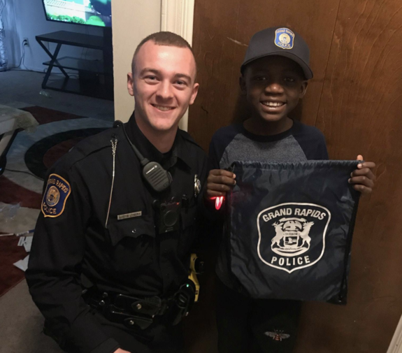 Police officer Austin Lynema helped give 9-year-old Thomas Daniel the ‘best birthday ever’ after nobody came to his party. Source: Grand Rapids Police Department/Facebook