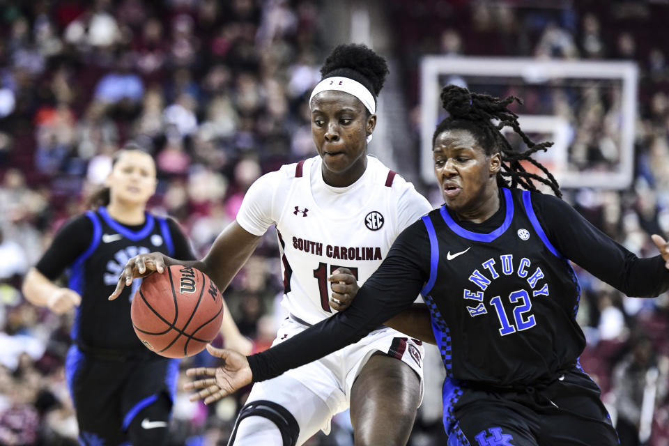 South Carolina forward Laeticia Amihere (15) dribbles the ball against Kentucky guard Amanda Paschal (12) during the second half of an NCAA college basketball game Thursday, Jan. 2, 2020, in Columbia, S.C. South Carolina defeated Kentucky 99-72.(AP Photo/Sean Rayford)
