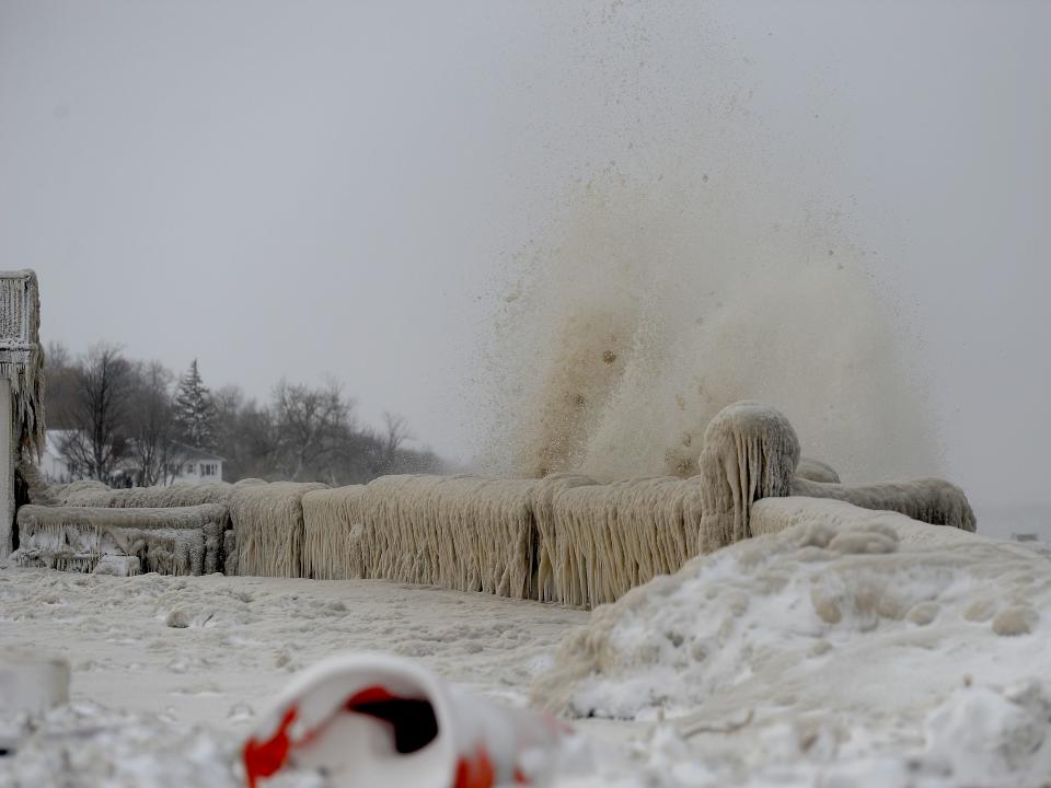 Ice and snow cover a railing along the Lake Erie shoreline on December 24, 2022 in Hamburg, New York. The Buffalo suburb and surrounding area was hit hard by the winter storm Elliott with wind gusts over 70 miles per hour battering homes and businesses through out the holiday weekend.