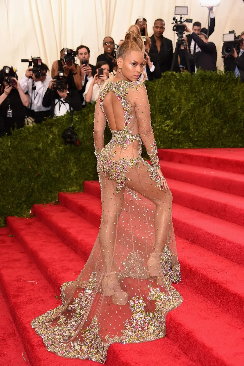 Beyoncé wears a sheer glittery dress as she attends the 