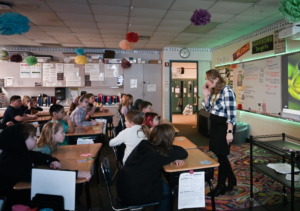 Sarah Simons, a counselor with Grand Ledge Public Schools, speaks with fourth-graders at Willow Ridge Elementary, Wednesday, Jan. 10, 2024, on ways they can resolve conflict through communication. There is a shortage of school counselors in the Greater Lansing area.