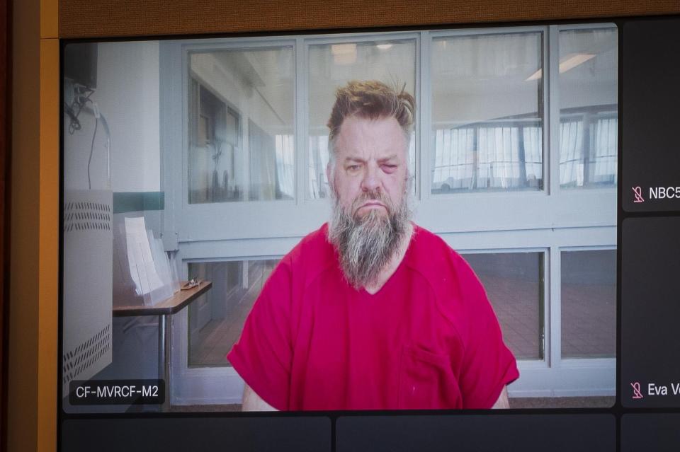 Daniel Banyai appears remotely in Rutland County Superior criminal court in Rutland, Vt., on Thursday, March 21, 2024. Banya, the owner of a firearms training center in Vermont has pleaded not guilty to felony aggravated assault stemming from an altercation during his arrest.(Glenn Russell/VTDigger via AP, Pool)