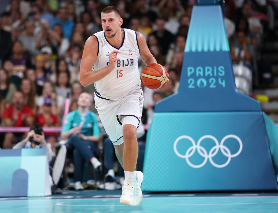 LILLE, FRANCE - AUGUST 03: Nikola Jokic #15 of Team Serbia dribbles the ball during a Men's basketball group phase-group C game between Serbia and South Sudan on day eight of the Olympic Games Paris 2024 at Stade Pierre Mauroy on August 03, 2024 in Lille, France. (Photo by Gregory Shamus/Getty Images)