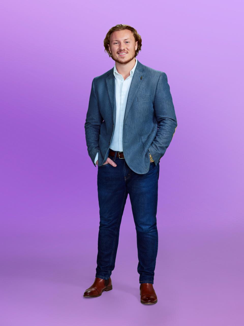 Johnny, a candidate at "Love is blind" Season 6, wearing a blue jacket and jeans