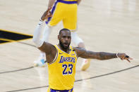 Los Angeles Lakers forward LeBron James celebrates his 3-pointer against the Phoenix Suns during the second half of Game 2 of an NBA basketball first-round playoff series Tuesday, May 25, 2021, in Phoenix. The Lakers won 109-102. (AP Photo/Ross D. Franklin)