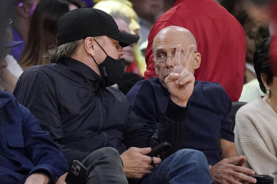 Actor Leonardo DiCaprio, left, sits with producer Jeffrey Katzenberg during the second half in Game 3 of a first-round NBA basketball playoff series between the Los Angeles Lakers and the Memphis Grizzlies Saturday, April 22, 2023, in Los Angeles. (AP Photo/Mark J. Terrill)