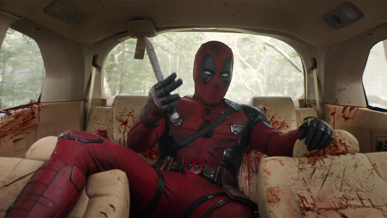  Deadpool in car taunting in Deadpool & Wolverine. 