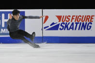 Nathan Chen falls during the men's short program at the Skate America figure skating event Friday, Oct. 22, 2021, in Las Vegas. (AP Photo/David Becker)