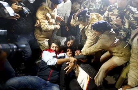 Police detain demonstrators during a protest against the release of a juvenile rape convict, in New Delhi, India, December 20, 2015. REUTERS/Adnan Abidi
