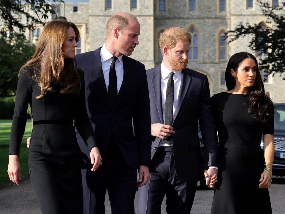 Catherine, Princess of Wales, Prince William, Prince of Wales, Prince Harry, Duke of Sussex, and Meghan, Duchess of Sussex on the long Walk at Windsor Castle arrive to view flowers and tributes to HM Queen Elizabeth on Saturday.