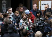 Belarussian author Svetlana Alexievich (C) answers journalists' questions after a news conference in Minsk, Belarus, October 8, 2015. REUTERS/Vasily Fedosenko