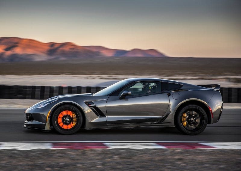 A Chevrolet Corvette C7 Z06 on a track with glowing front brakes