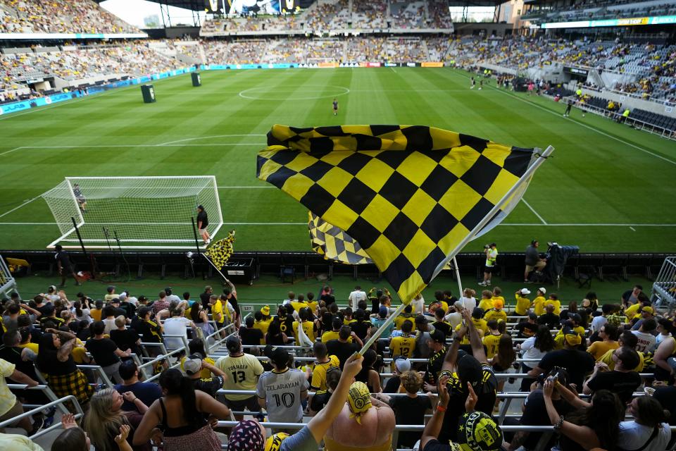 Columbus Crew fans wave flags in the Nordecke prior to the MLS soccer game against the New York Red Bulls at Lower.com Field.