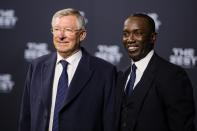 <p>Ex-Manchester United boss Sir Alex Ferguson with Dwight Yorke </p>