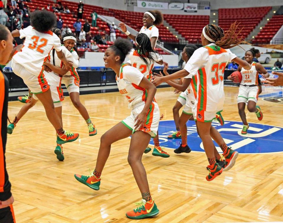 Blanche Ely HS Zaria Blake (4) leaps as the clock expires and hey defeat Wekiva HS in the 6A finals of the FHSAA Girl’s State Championships in Lakeland, Florida, February 29, 2020.