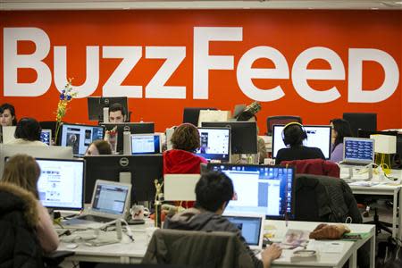 Buzzfeed employees work at the company's headquarters in New York January 9, 2014. BuzzFeed has come a long way from cat lists. REUTERS/Brendan McDermid