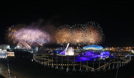 Fireworks explode over the Olympic Park during the closing ceremony for the 2014 Sochi Winter Olympics, February 23, 2014. REUTERS/Shamil Zhumatov