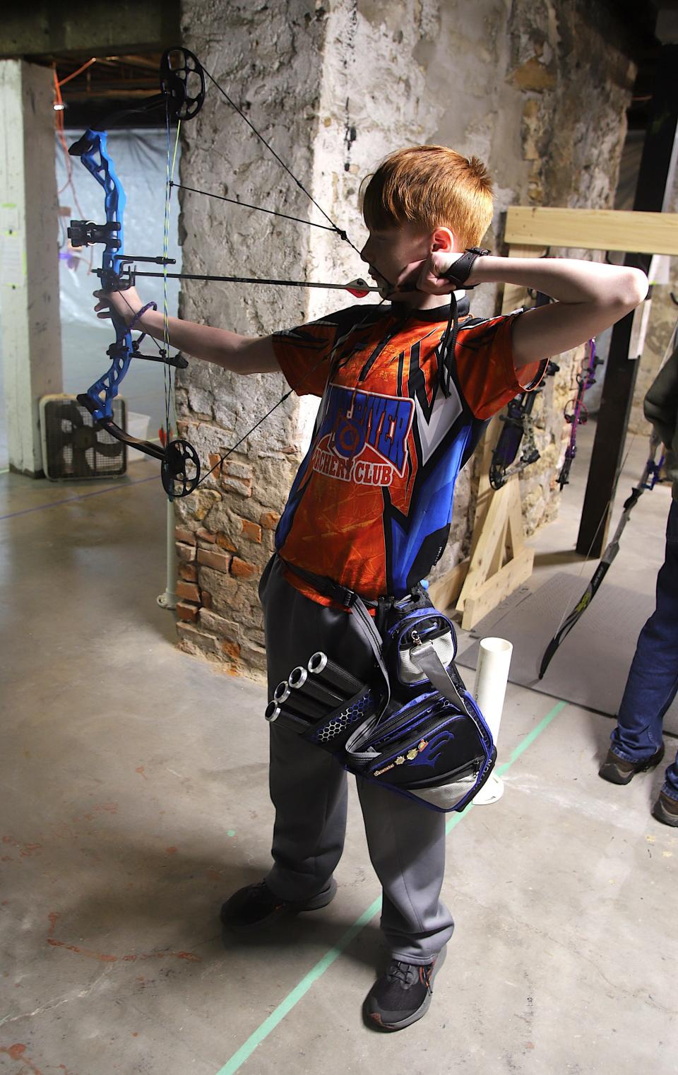 Wyatt Sullivan, 11, of Burlington aims for the target at the Flint River Archery Club on Wednesday.