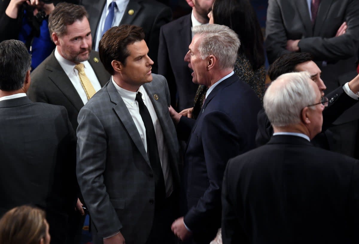 Matt Gaetz, left, eventually voted ‘present’ to allow Kevin McCarthy to be elected House Speaker (AFP via Getty Images)