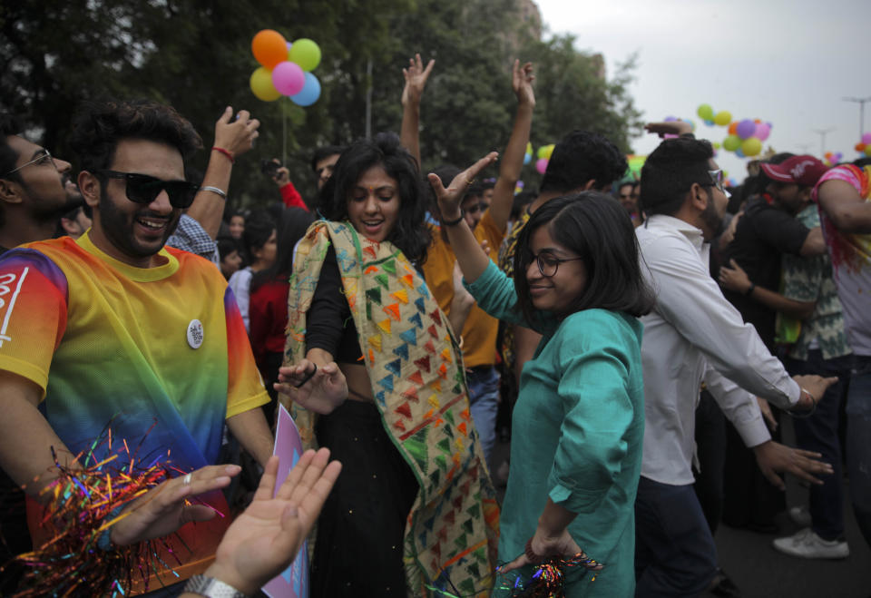 Members of the LGBTQ community and their supporters march during the annual Delhi Queer Pride parade in New Delhi, India, Sunday, Nov.24, 2019. More than 1,000 members of the LGBTQ community and their supporters marched through New Delhi to celebrate India’s sexual diversity, which they say is progressing but still has a long way to go to become a more accepting place for them. (AP Photo/ Rishabh R. Jain)