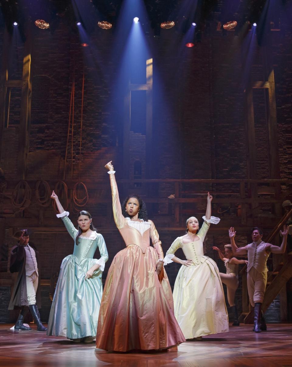 Elise Goldsberry, center, portrays Angelica Schuyler alongside Phillipa Soo, left, and Jasmine Cephas Jones.