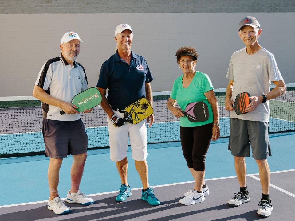 "Mr. Pickleball" Bob Mitchell (far right) organizes regular pickleball matches for seniors in the area around Loma Linda. Here, he's playing with (from left) J Mailen Kootsey, 84, John Testerman, 78, and Lucy Lett, 89.