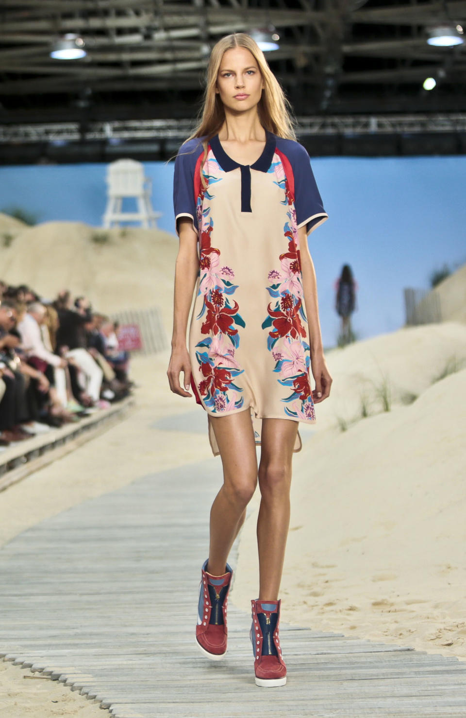 Fashion from the Tommy Hilfiger Spring 2014 collection is modeled on Monday, Sept. 9, 2013 in New York. (AP Photo/Bebeto Matthews)