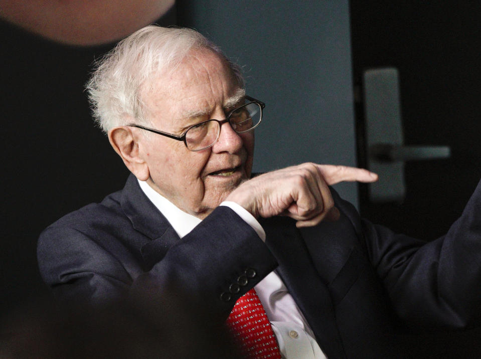 Warren Buffett, chairman and CEO of Berkshire Hathaway, gestures during a game of bridge outside Berkshire-owned Borsheims jewelry store in Omaha, Neb., Sunday, May 6, 2018. On Saturday, tens of thousands of Berkshire Hathaway shareholders attended the annual Berkshire Hathaway shareholders meeting. (AP Photo/Nati Harnik)