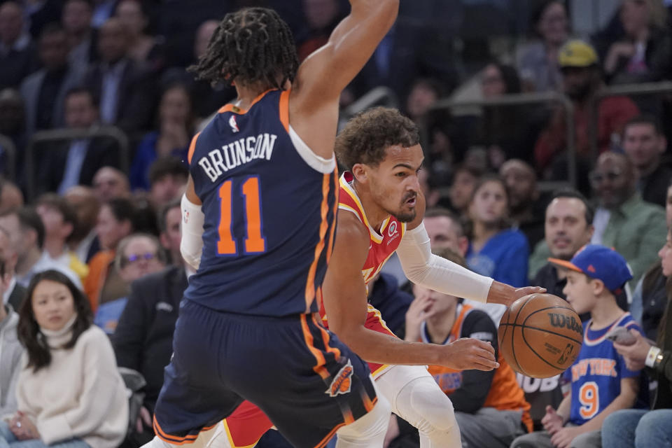Atlanta Hawks guard Trae Young drives against New York Knicks guard Jalen Brunson (11) during the first half of an NBA basketball game Wednesday, Nov. 2, 2022, at Madison Square Garden in New York. (AP Photo/Mary Altaffer)