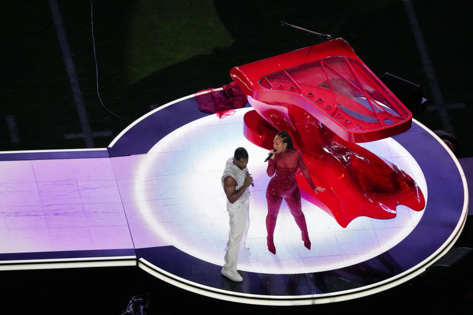 Usher, left, and Alicia Keys perform during halftime of the NFL Super Bowl 58 football game between the San Francisco 49ers and the Kansas City Chiefs Sunday, Feb. 11, 2024, in Las Vegas. (AP Photo/David J. Phillip)