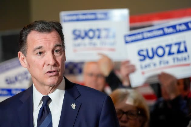 Former Rep. Tom Suozzi (D-N.Y.), who is running to replace expelled Rep. George Santos in Congress, speaks at an event in Plainview, New York, on Sunday. Suozzi has pointed to his record of bipartisan compromise as evidence of how he'd address immigration.