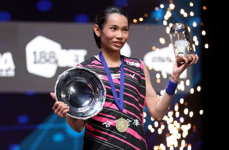 Badminton - Yonex All England Open Badminton Championships - Arena Birmingham, Birmingham, Britain - March 18, 2018 Taiwan's Tai Tzu Ying celebrates with the trophy after victory in the women's singles final Action Images via Reuters/Peter Cziborra